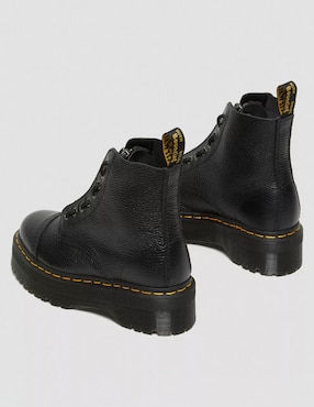 Bota combat arriba del tobillo Dr. Marten's de cuero para mujer
