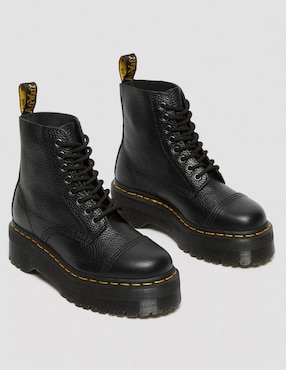 Bota combat arriba del tobillo Dr. Marten's de cuero para mujer